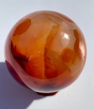 Load image into Gallery viewer, Carnelian Sphere - Dragon Mama Crystals 