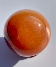 Load image into Gallery viewer, Carnelian Sphere - Dragon Mama Crystals 