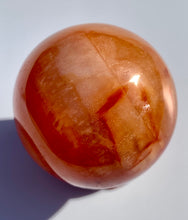 Load image into Gallery viewer, Carnelian Sphere - Dragon Mama Crystals 